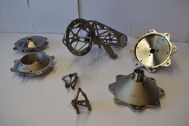 Seven metal printed components of Thales Alenia Space's ETHM