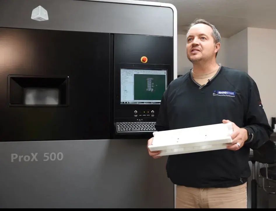 CEO of Idaho Steel, Alan Bradshaw, demonstrates 3D printed machine parts