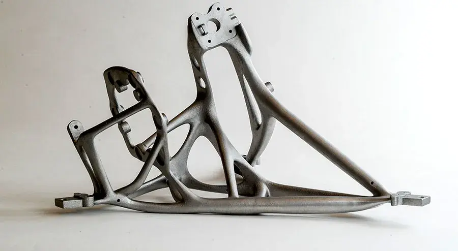 Topologically optimized aerospace bracket 3D print with the DMP Factory 350 metal powder bed fusion printer by Thales