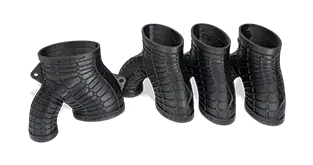 A manifold adaptor made from Figure 4 RUBBER-BLK 10 