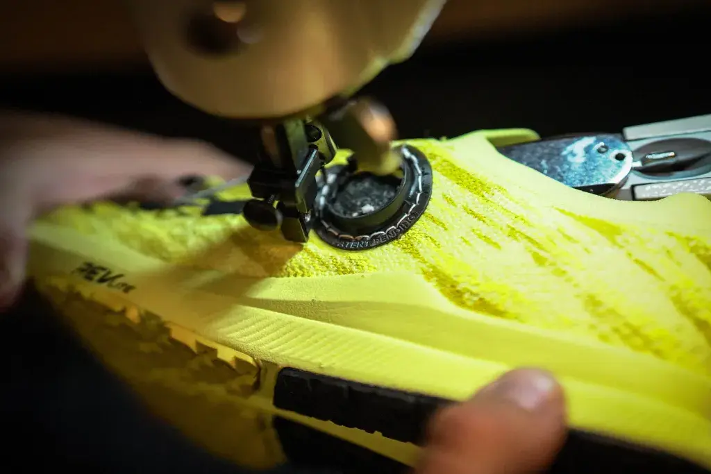 Figure 4 prototype for BOA Fit System being stitched on shoe