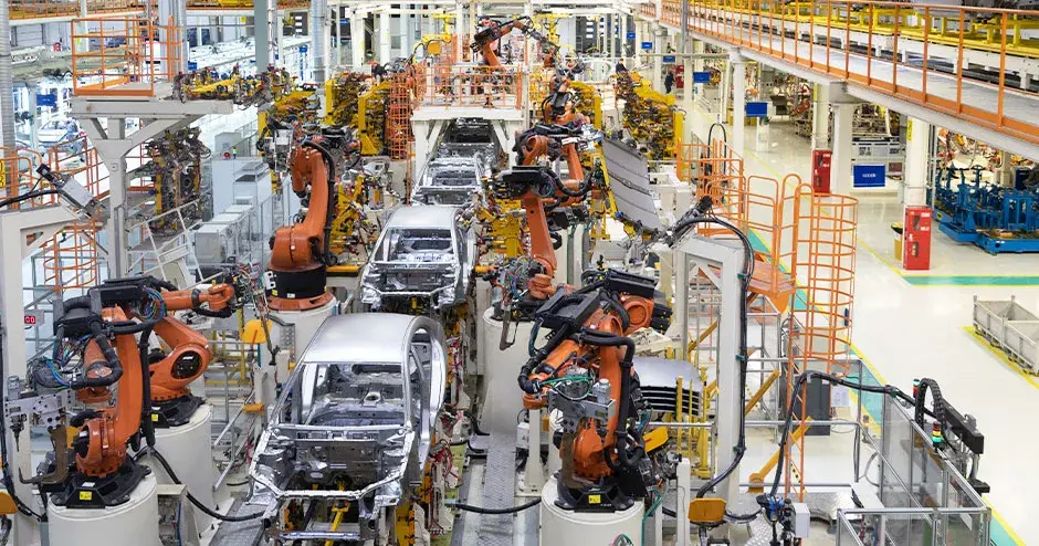 an assembly line in an automotive manufacturing facility