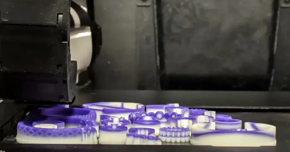 printer with platform filled with an assortment of jewelry images illustrating reliability