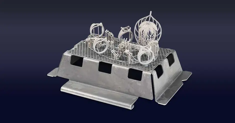 figure 4 jewel master gry jewelry pieces on a print tray