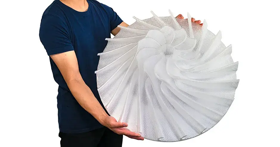 a man holding and impeller