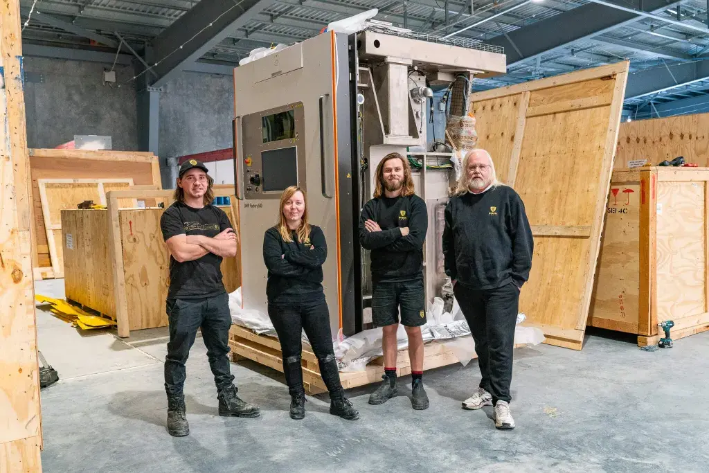 Team at Rodin Cars unboxing their new DMP Factory 500