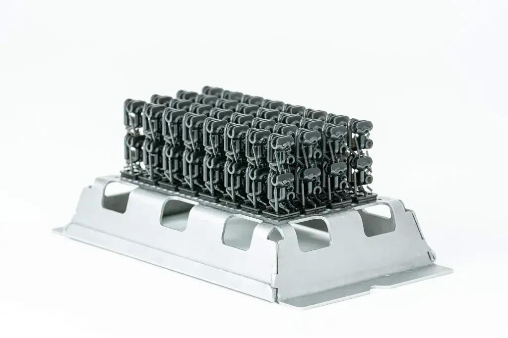 Figure 4 build plate full of stacked 3D printed parts