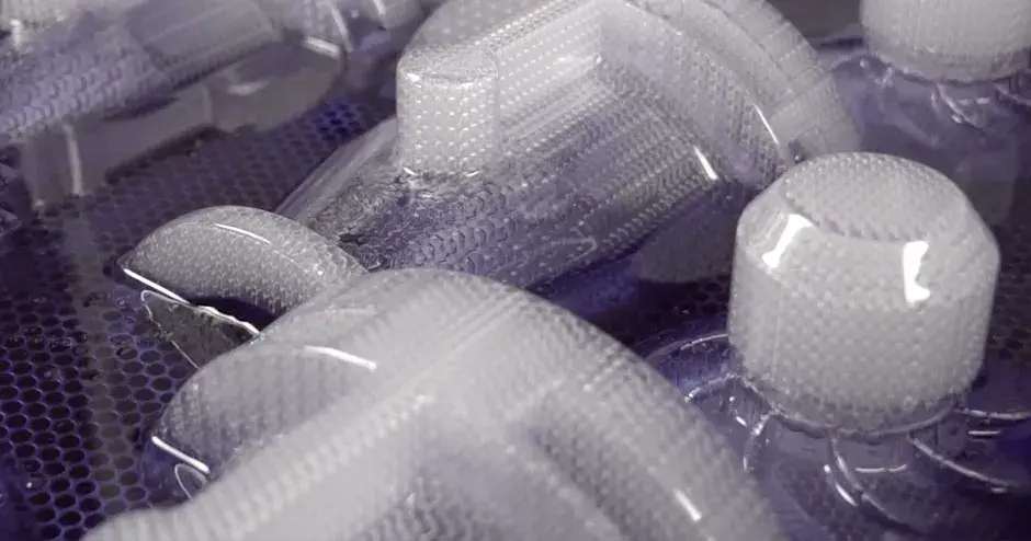 3D printed investment casts emerging from a 3D printer