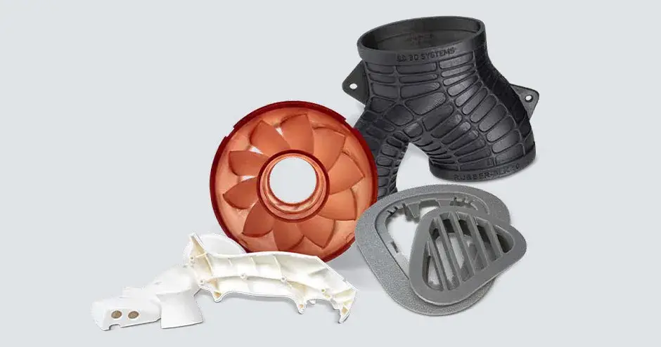 An assortment of 3D printed parts made from different materials