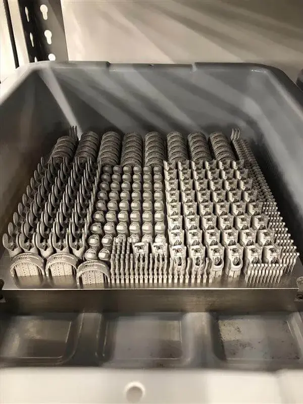 Build tray of metal 3D printed parts for Point Design's partial hand prosthetics