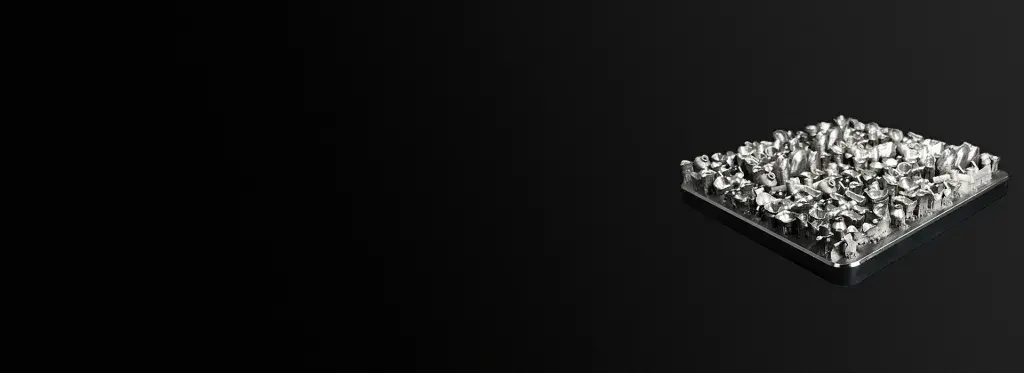 a tray of 3D printed metal crowns