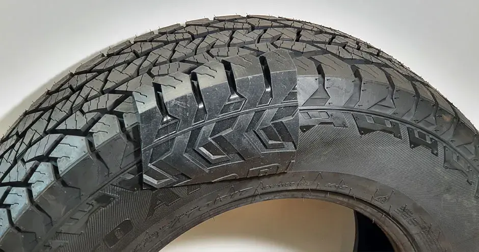 a close up of a hankook tire showing the textures in the tread