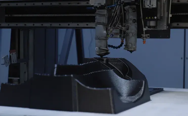 A thermoforming mold print underway at  Lindar on the 3D Systems EXT 1270 Titan Pellet printer. 