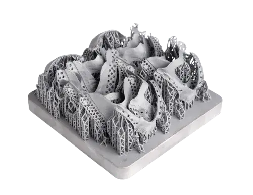 3D printed DMP dental parts on a tray