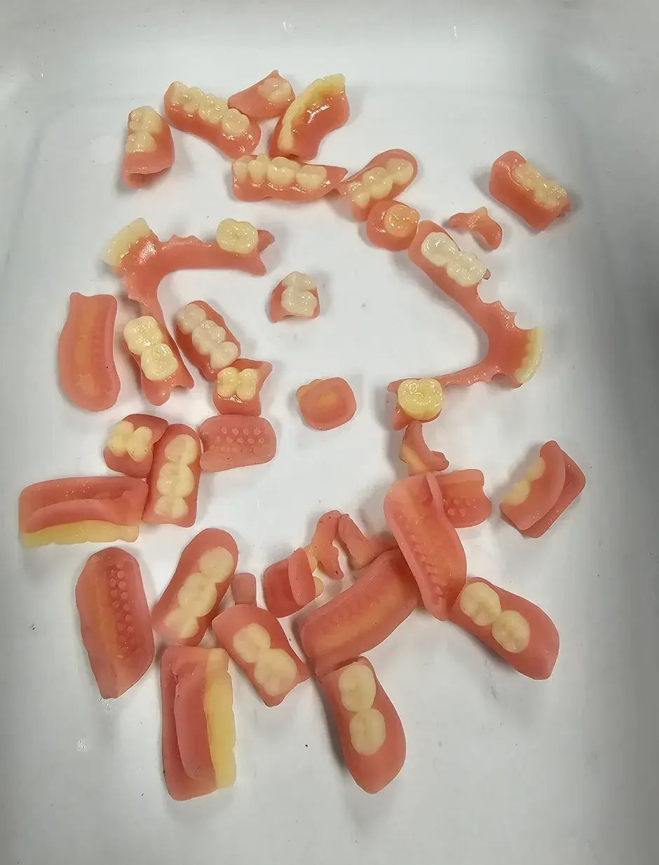 a tray of 3D printed dental parts