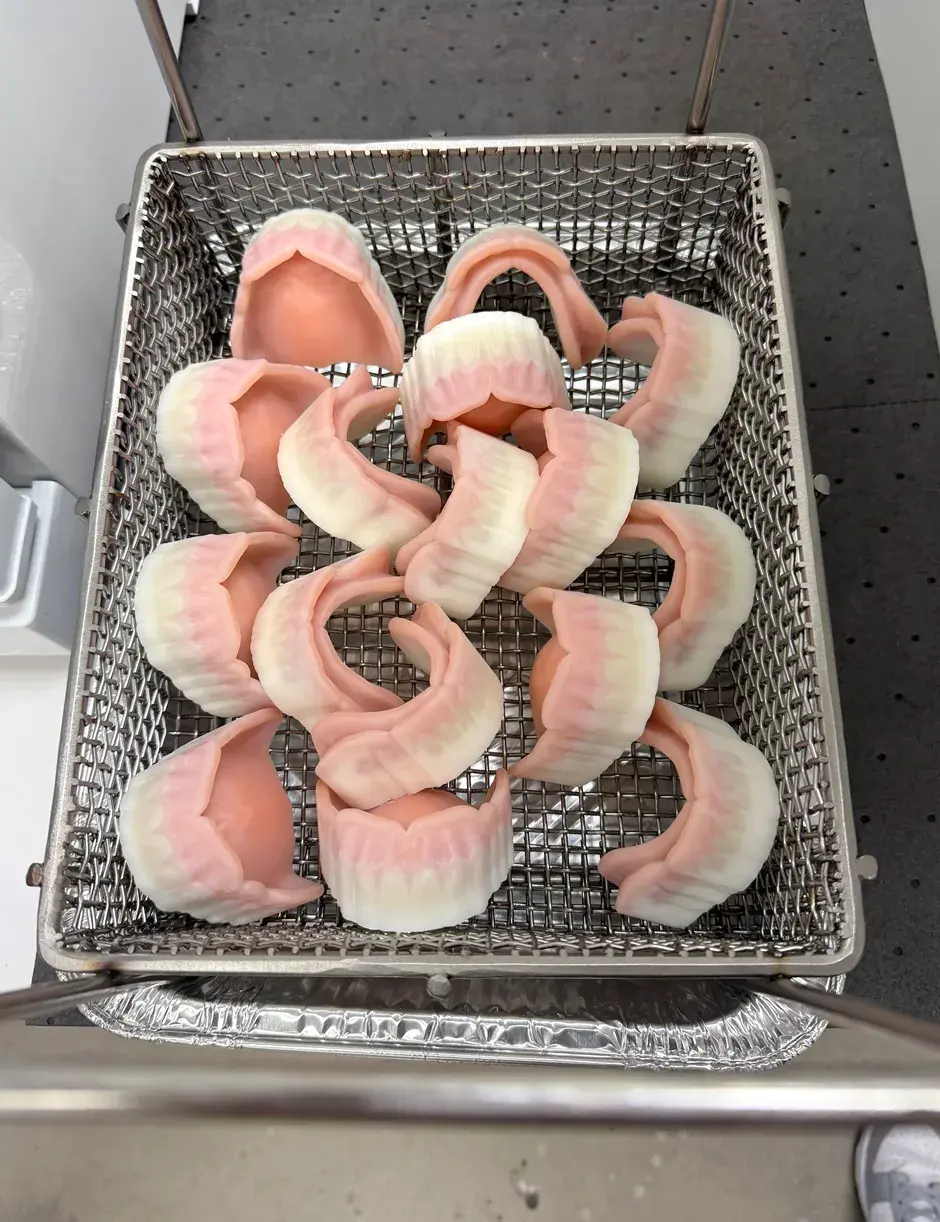 a basket of jetted dentures