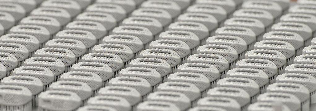 Production build of metal 3D printed spinal implants at rms
